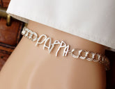 a close up of a person wearing a bracelet